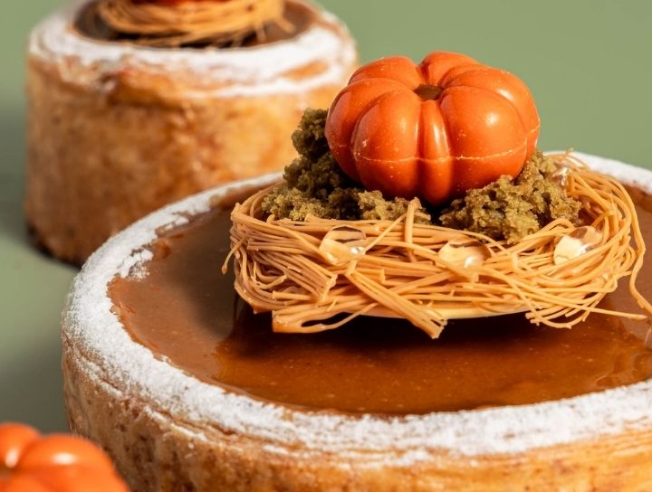 pastry creation with pumpkin decoration on top