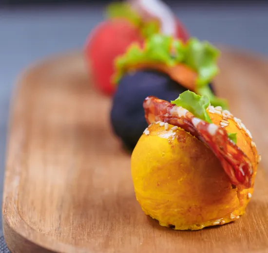 turmeric, tomato and squid ink bun