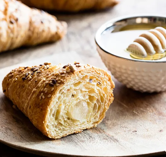 Cereals and honey croissant
